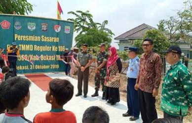 Peresmian salah satu hasil pembangunan TMMD Ke 106 oleh Kodim 0509/Kab Bekasi yakni pengecoran jalan sepanjang 1.000 meter × 3 meter × 15 sentimeter di Kp Pengarengan RT 014/006 Dusun II Desa Sukadaya Kecamatan Sukawangi, Kamis (31/10).