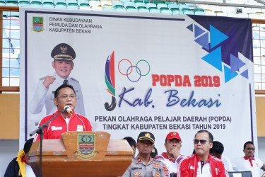 Bupati Bekasi Eka Supria Atmaja saat membuka Pekan Olahraga Pelajar Daerah (Popda) tingkat Kabupaten Bekasi 2019 pada Rabu (18/12) pagi