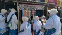 Pelaksanaan MTQ ke-55 Kabupaten Bekasi tahun 2023 di Kecamatan Sukawangi memberikan berkah kepada para pedagang es capucino cincau