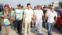 Plt Bupati Bekasi dr. Asep Surya Atmaja menghadiri Puncak Hari Nasional ke-79 tahun sekaligus mengikuti Gerak Jalan Sehat yang berlangsung di Cinity Cikarang Utara pada Sabtu (26/07)